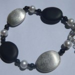 Armband aus 925 Sterlingsilber mit Perlen und Onyx